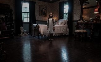 The ghost of their death daughter haunts a family in "A Savannah Haunting"