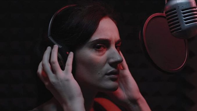 A cursed radio is the link between good and evil in "Sound of Silence"